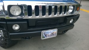 GMC Hummer with license plate OMG MPG